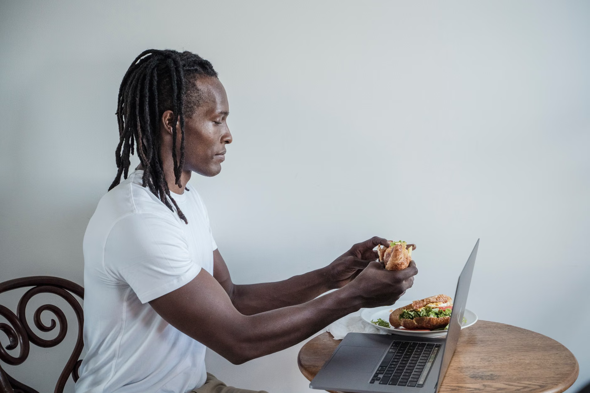person eating sandwich nyc